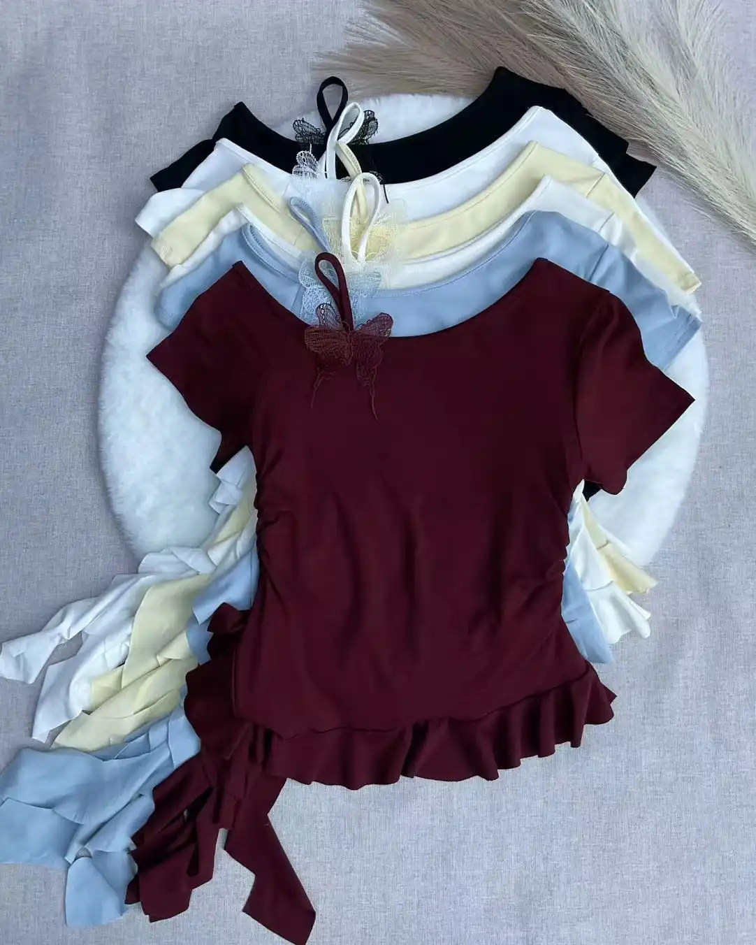 Product image of Butterfly Detail Asymmetric Ruffle Hem Ruched Tee