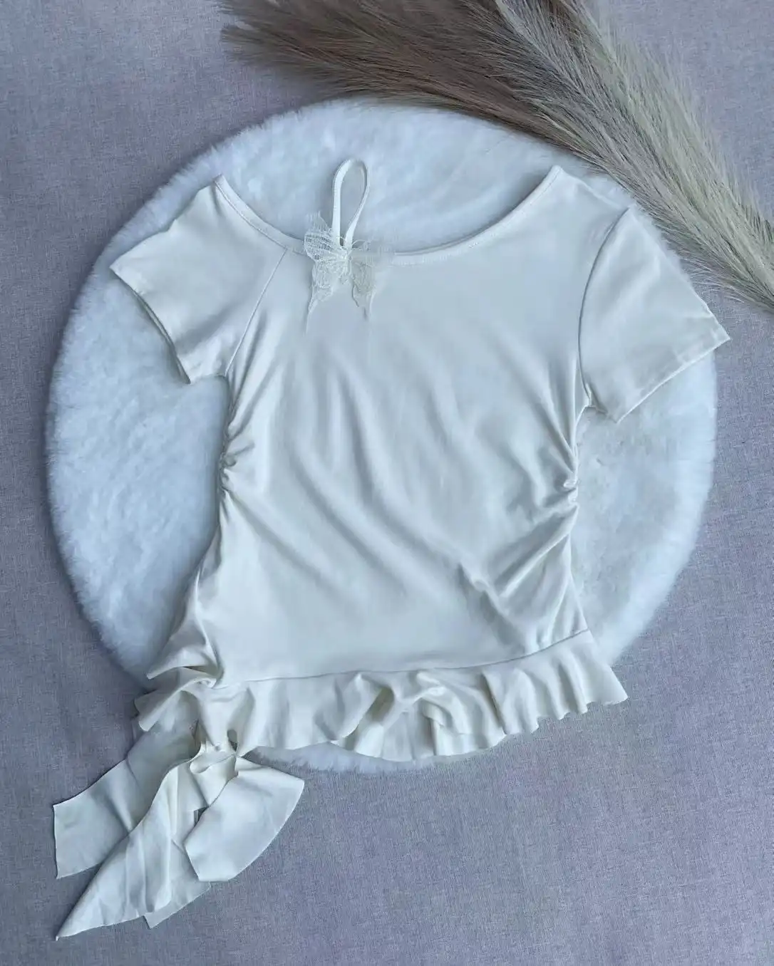 Product image of Butterfly Detail Asymmetric Ruffle Hem Ruched Tee