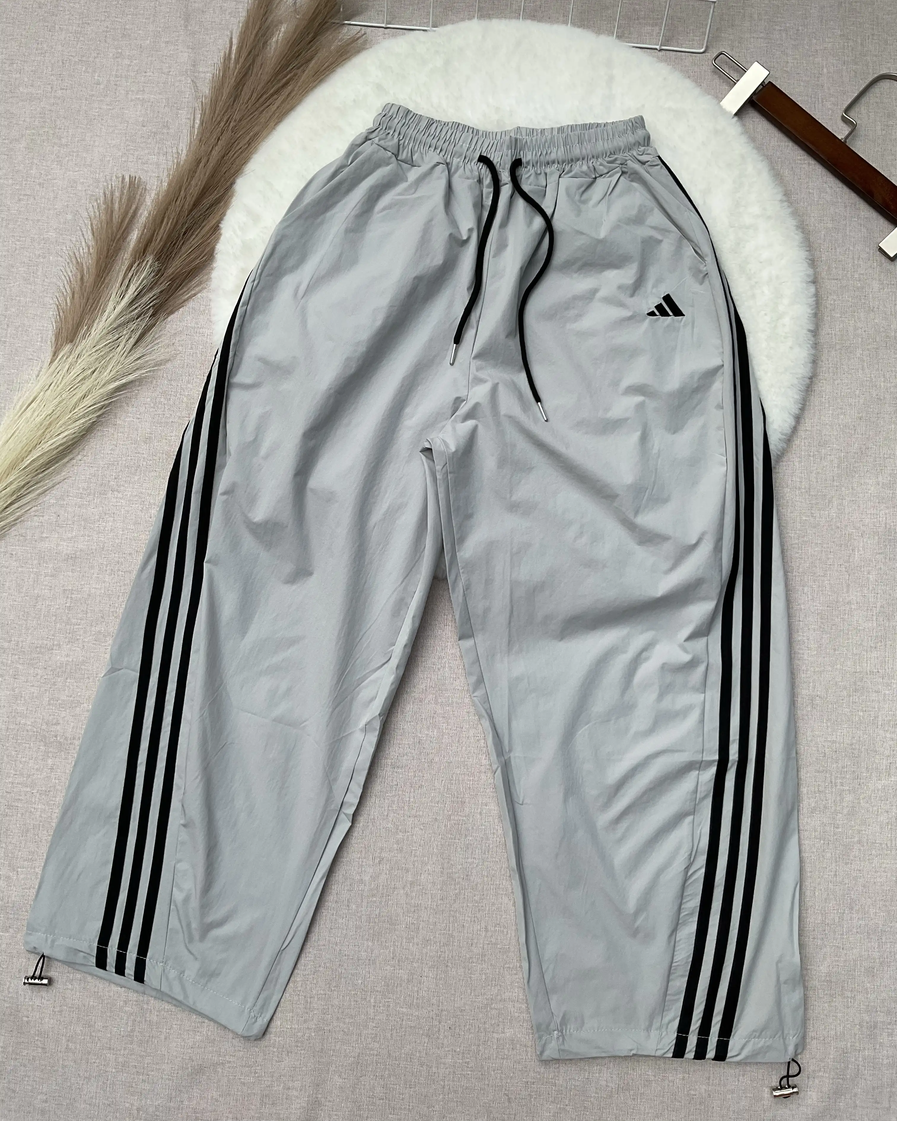 Product image of Three-Stripe Low-Waist Parachute Pants