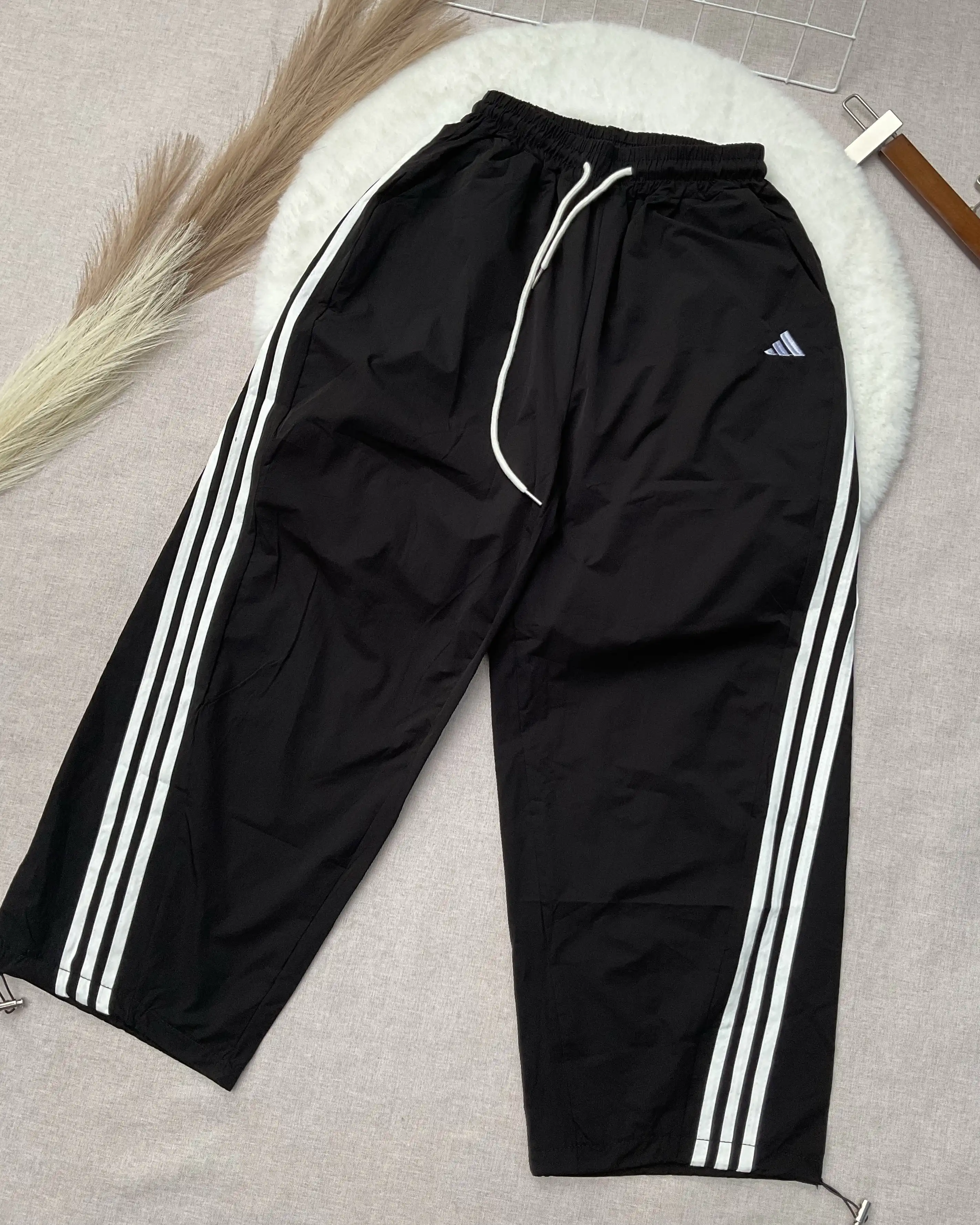 Product image of Three-Stripe Low-Waist Parachute Pants