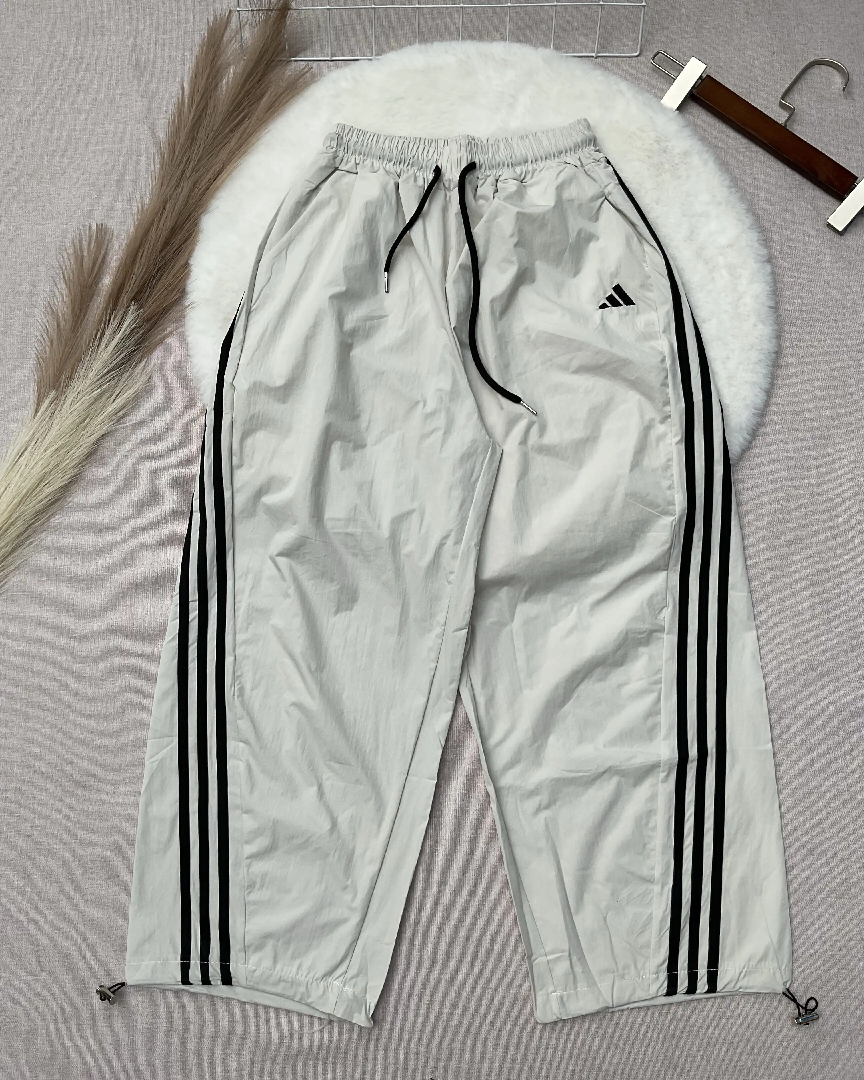 Product image of Three-Stripe Low-Waist Parachute Pants