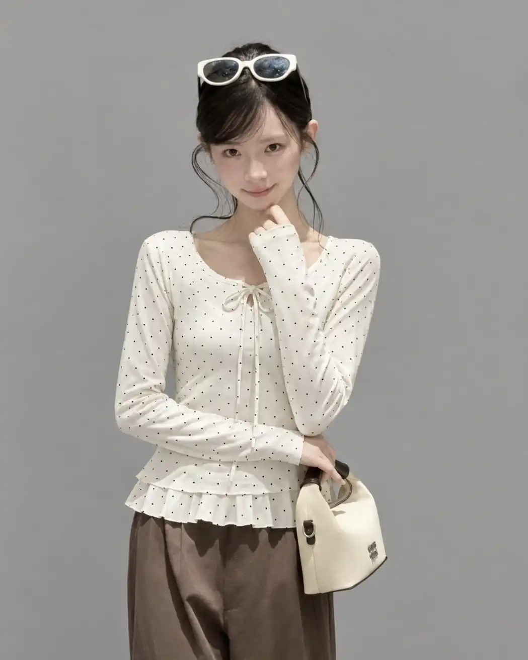 Product image of Dainty Dot Ruffle Tie-Front Top
