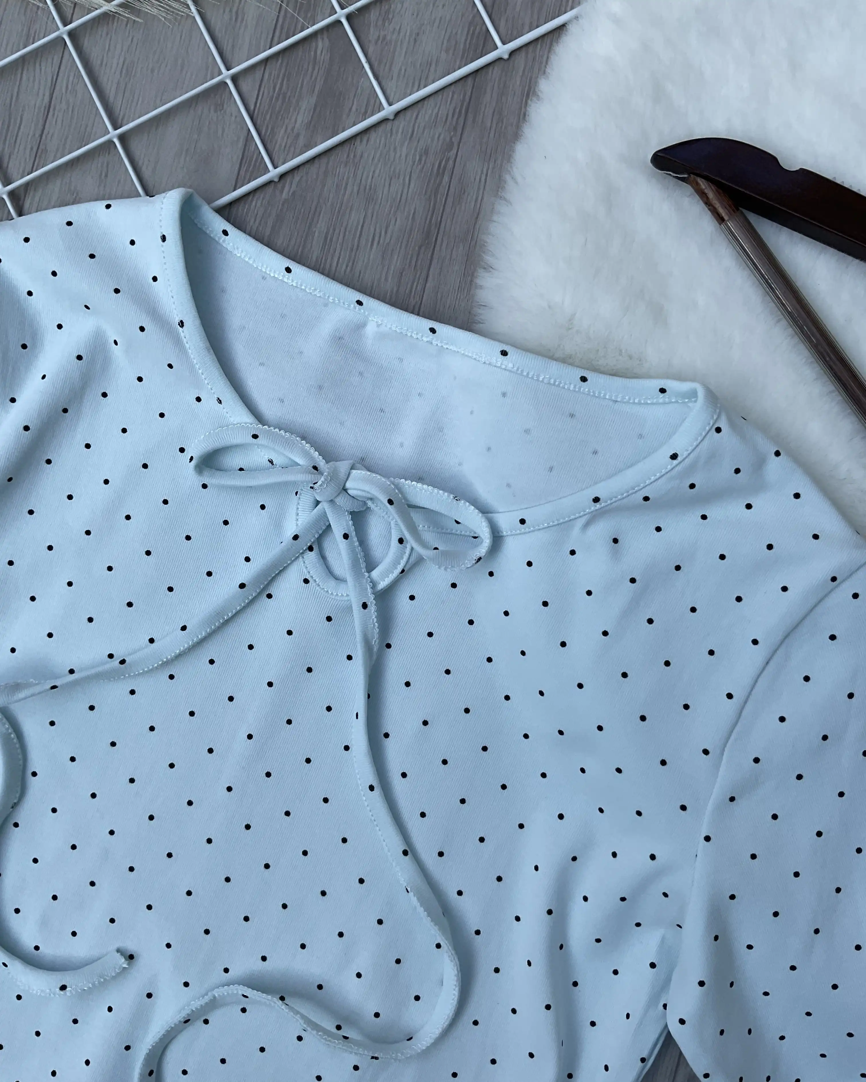 Product image of Dainty Dot Ruffle Tie-Front Top