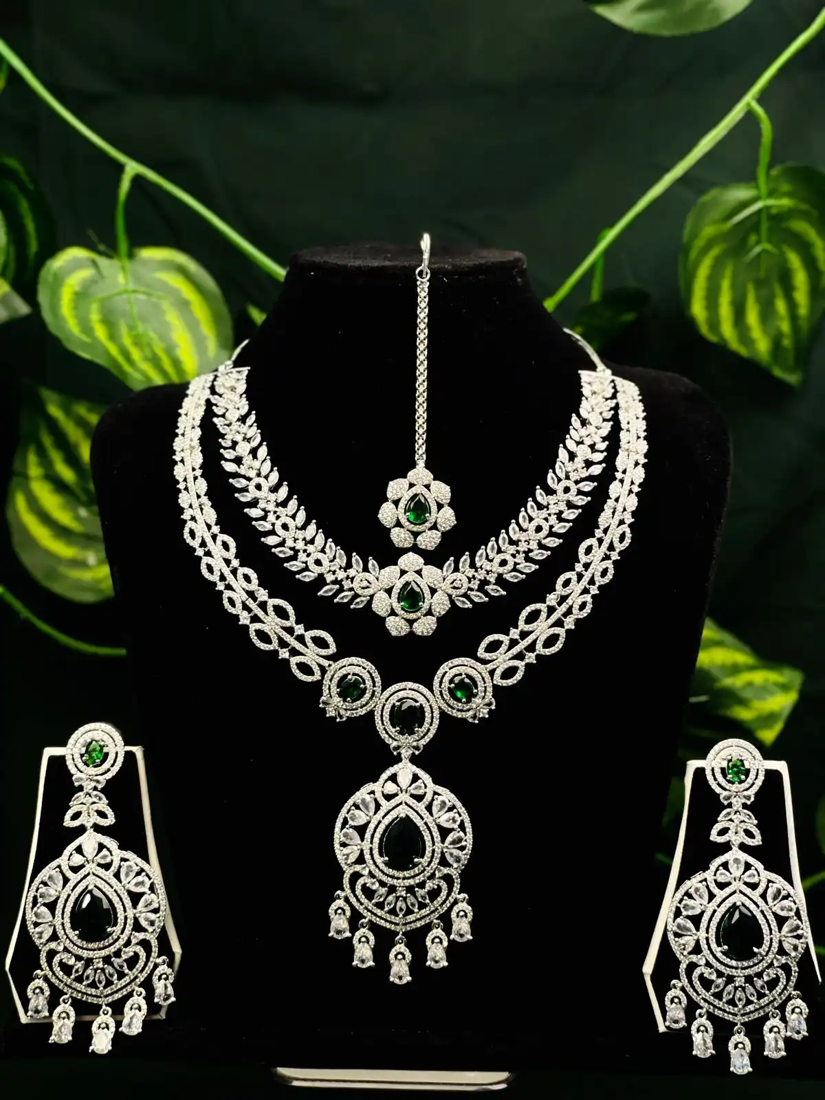 Product image of ADN3110 | Grand American Diamond & Emerald Green Multi-Layered Jewelry Set (Necklace, Earrings, Maang Tikka)
