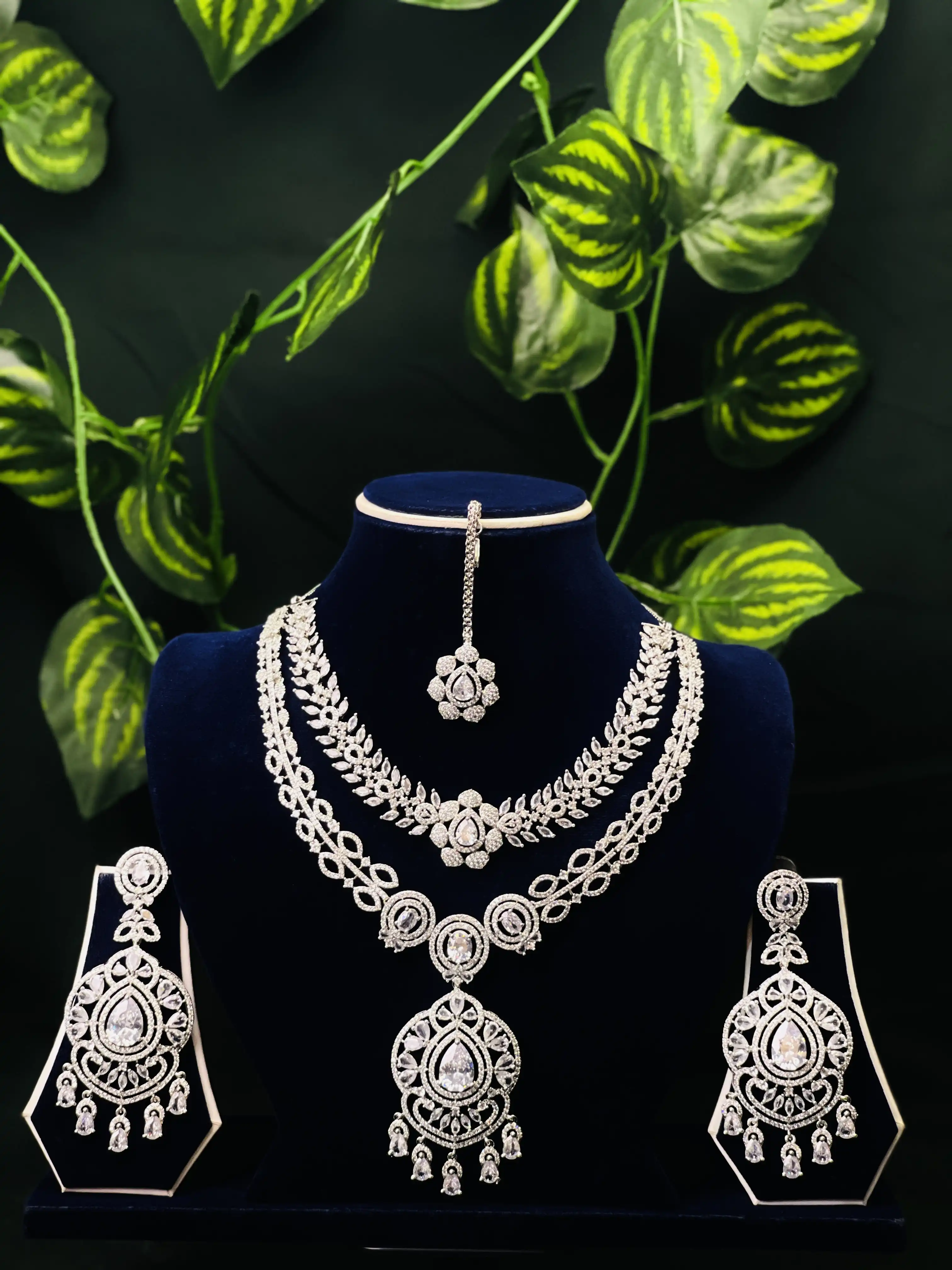 Product image of ADN3110 | Grand American Diamond & Emerald Green Multi-Layered Jewelry Set (Necklace, Earrings, Maang Tikka)