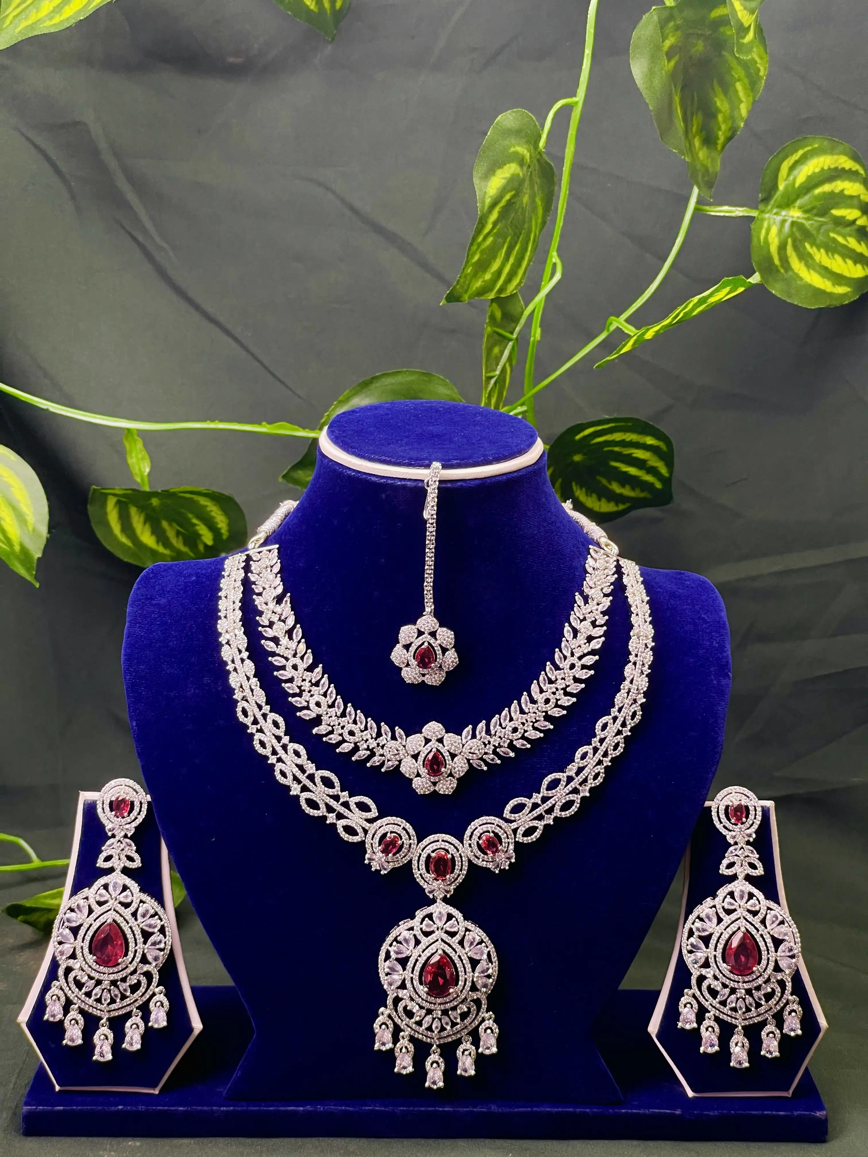 Product image of ADN3110 | Grand American Diamond & Emerald Green Multi-Layered Jewelry Set (Necklace, Earrings, Maang Tikka)