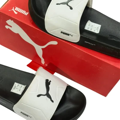 Puma White slides with black lo...