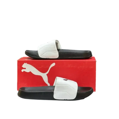 Puma White slides with black lo...