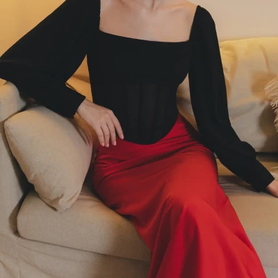 Corset top with voluminous slee...