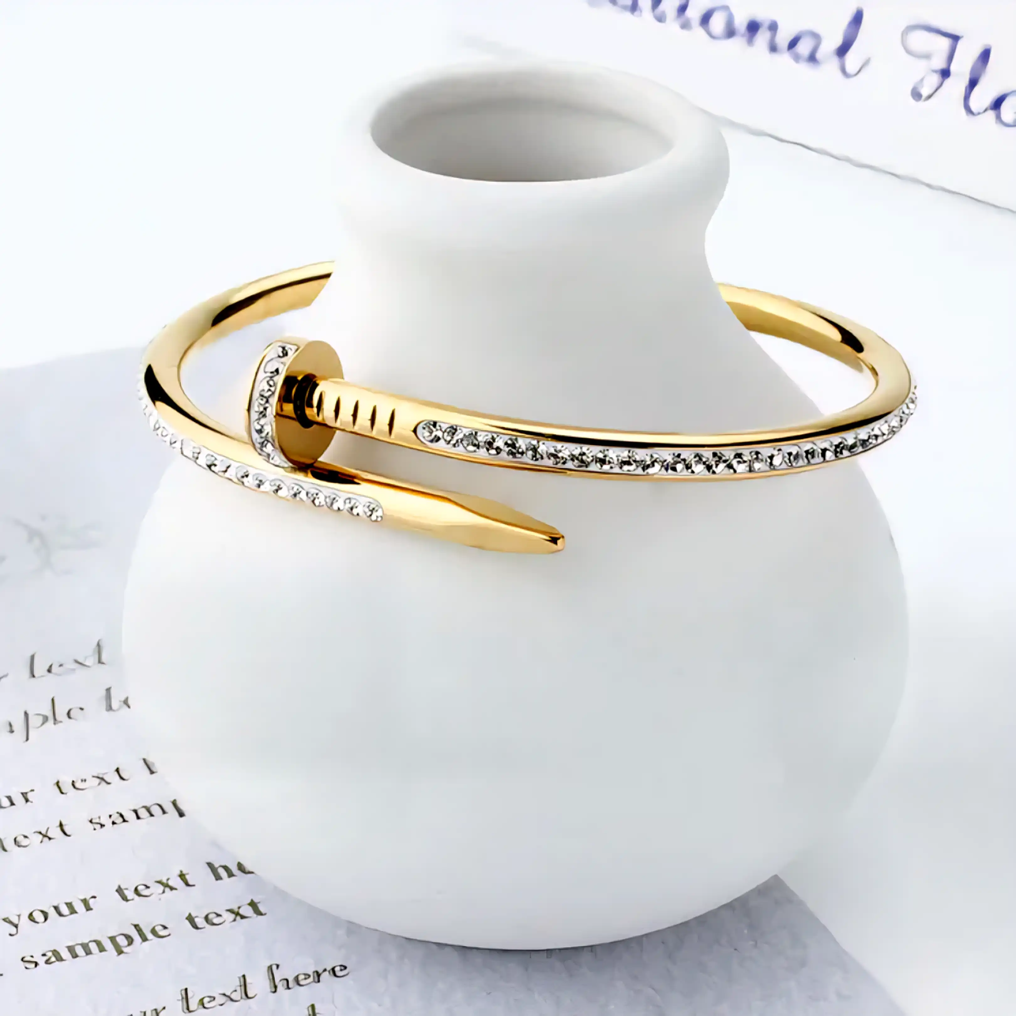 Product image of ZENOURA 18K GOLD PLATED STUDDED CARTIER NAIL BRACELET BANGLE