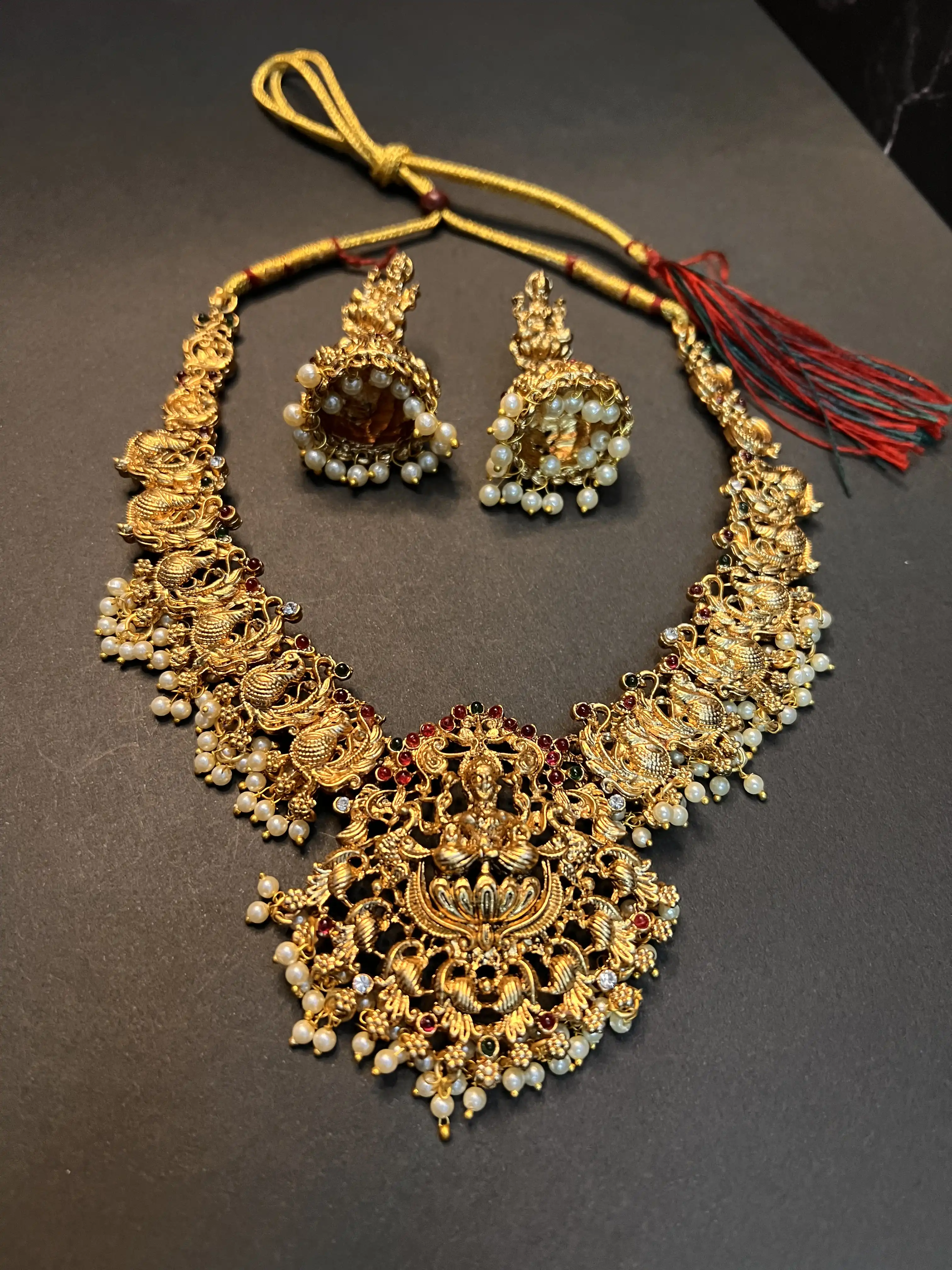 Product image of Lakshmi Peacock Temple Gold Plated Bridal Necklace Set with Pearl Jhumkas