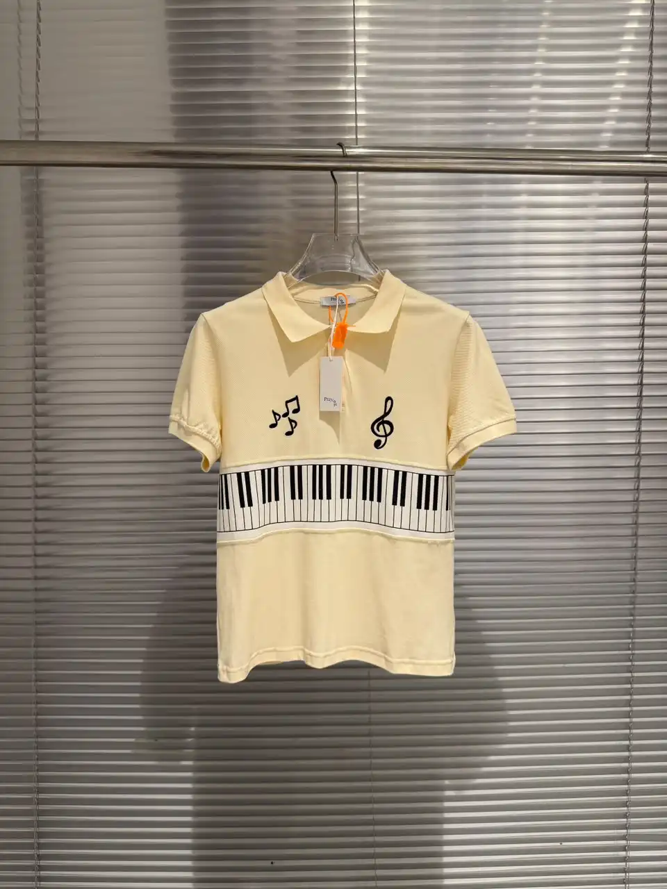 Product image of 750 piano music sign embroidery polo t-shirt