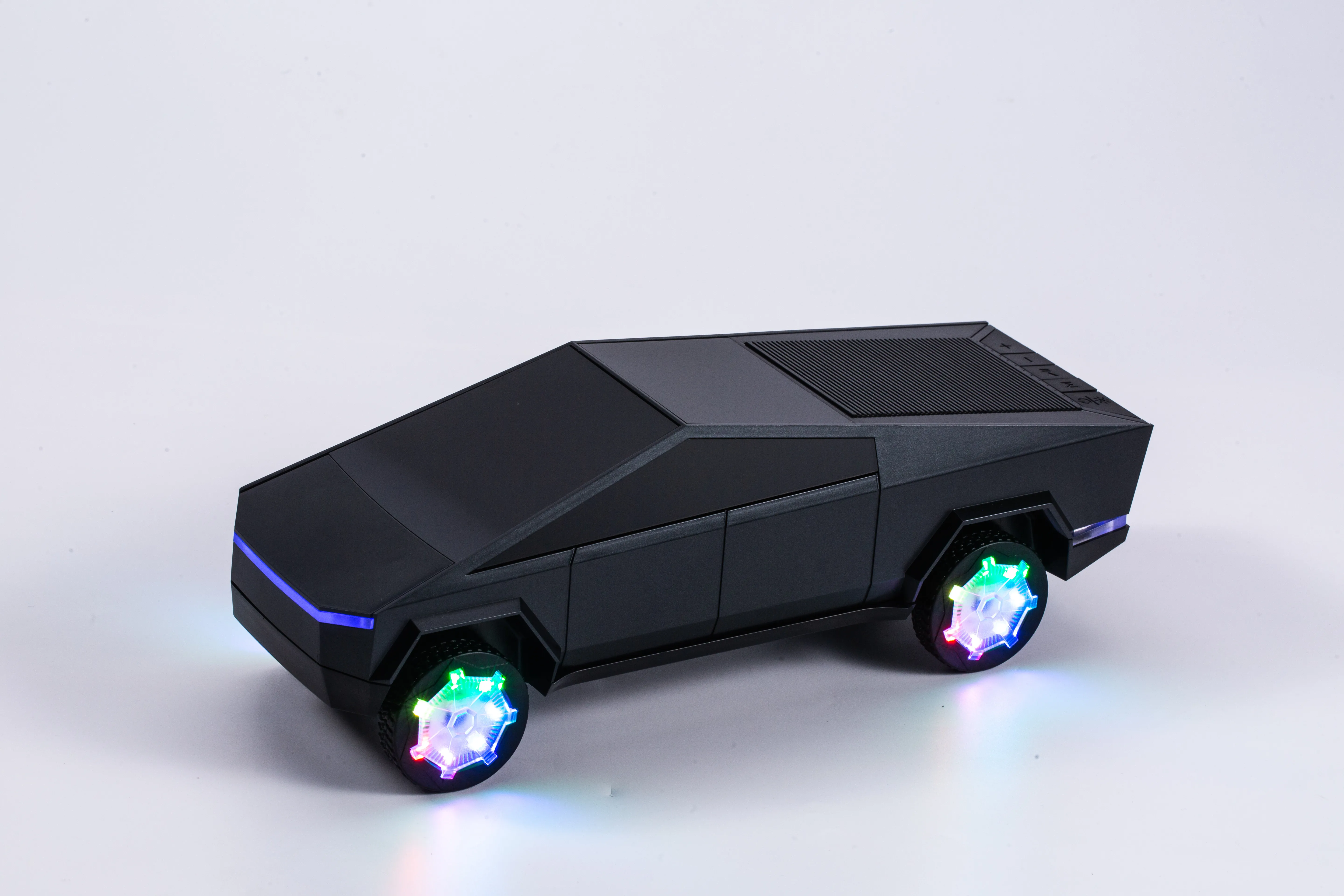 Product image of Tesla Cyber Pickup Car Shaped Bluetooth Speaker and Wireless Charging
