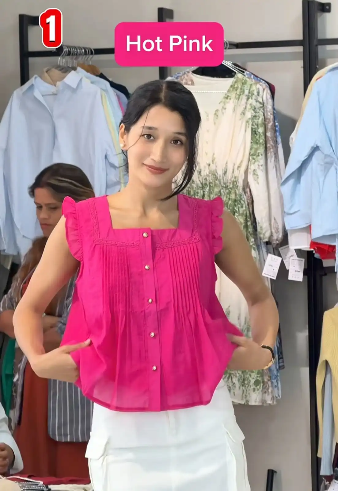 Product image of SLEEVELESS RUFFLE TOP