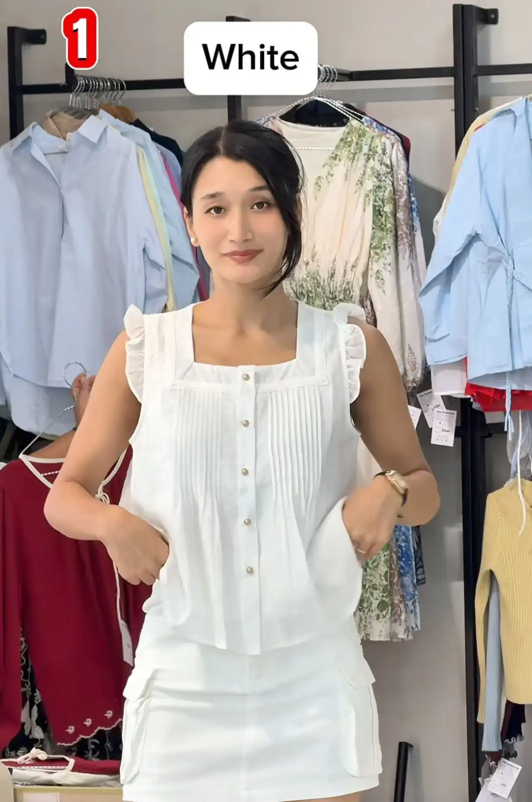 Product image of SLEEVELESS RUFFLE TOP