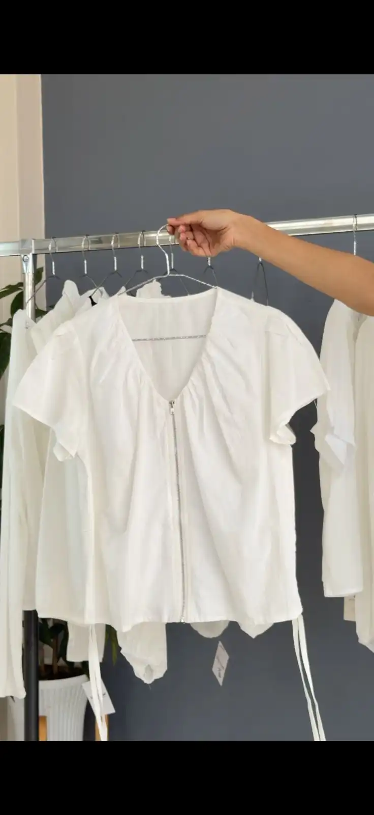 Product image of V NECK ZIPUP TOP