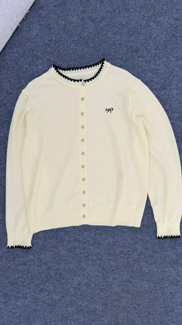 Product image of CUTE BOW CARDIGAN