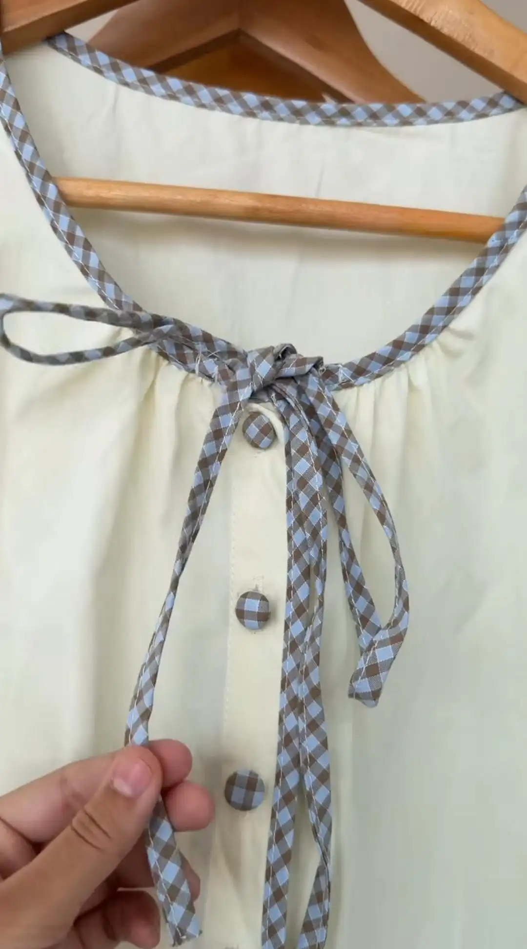 Product image of PEPLUM TOP WITH CHECKED DRAWSTRING